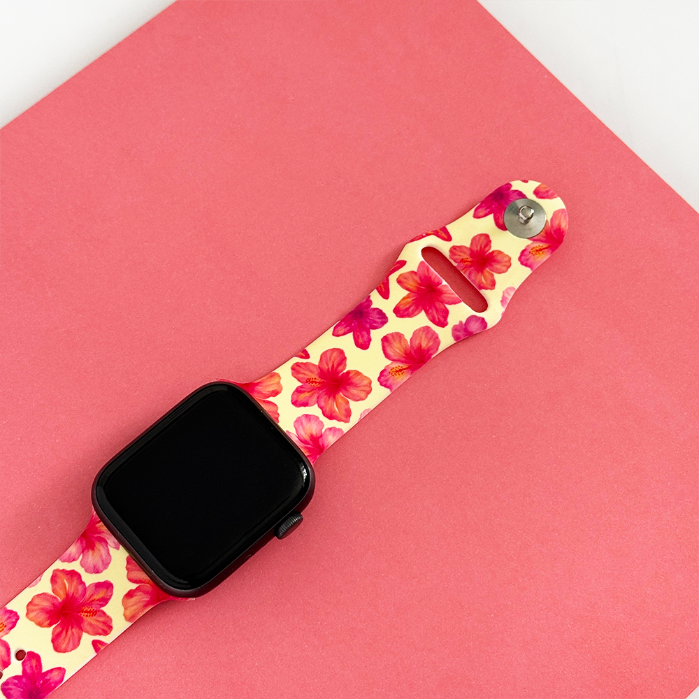 Butter yellow Apple Watch strap with hibiscus floral pattern by Coconut Lane.