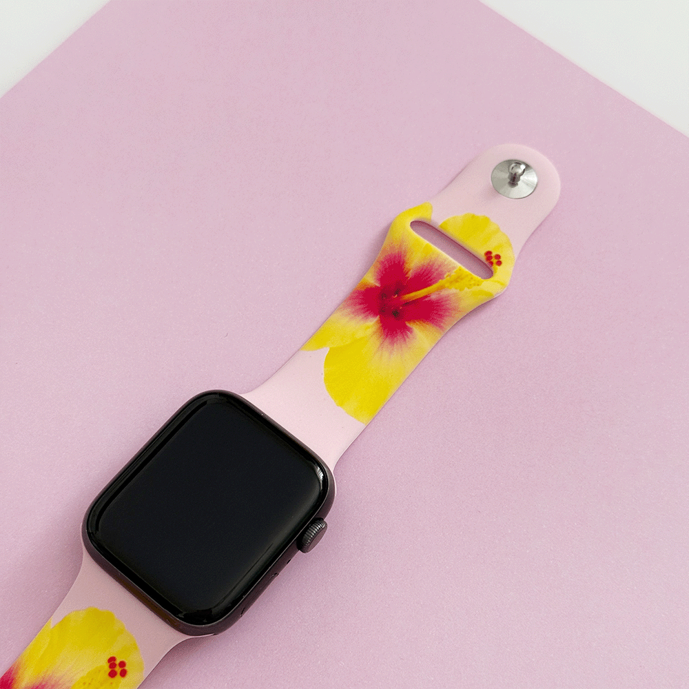 Pink Apple Watch Strap with yellow hibiscus flowers.
