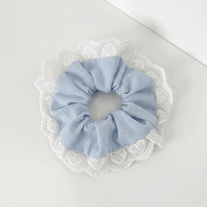 Light blue Scrunchie with heart lace edging. 