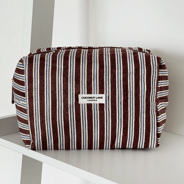 Brown towel texture Makeup Bag with blue and white stripe design. 