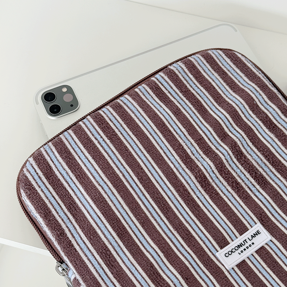 Brown, white and blue striped iPad Sleeve with silver zip and Coconut Lane logo badge.