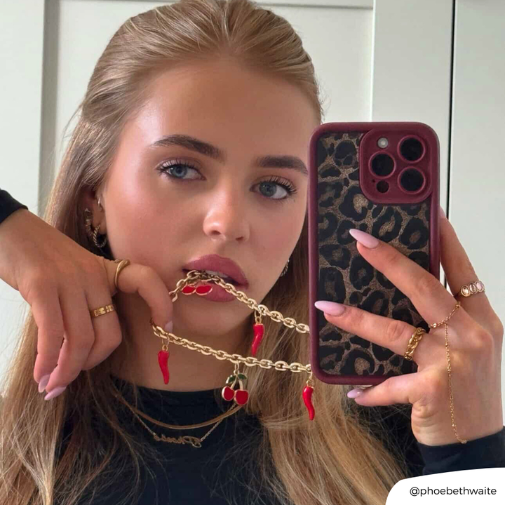 Close up mirror selfie with Burgundy Leopard Phone Case with a Phone Strap attached