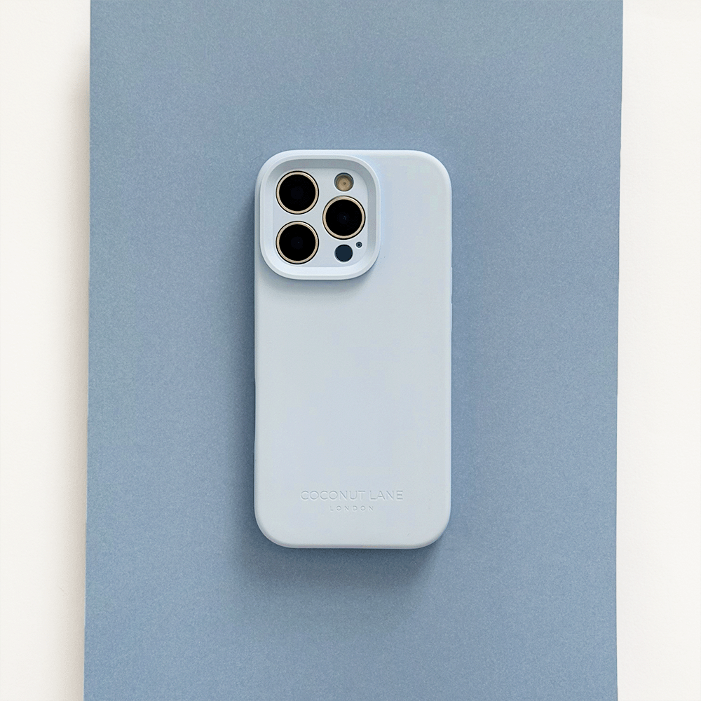 Blue Phone Case with 'Coconut Lane' branding on a pink background.