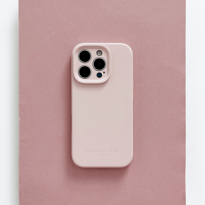 Pink Phone Case with 'Coconut Lane' branding on a pink background.