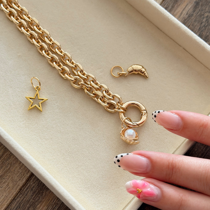 Gold Croissant Charm on Phone Strap