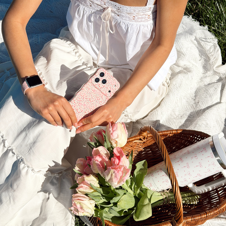 Girls Dainty Bows Tumbler in a basket of flowers at a spring picnic