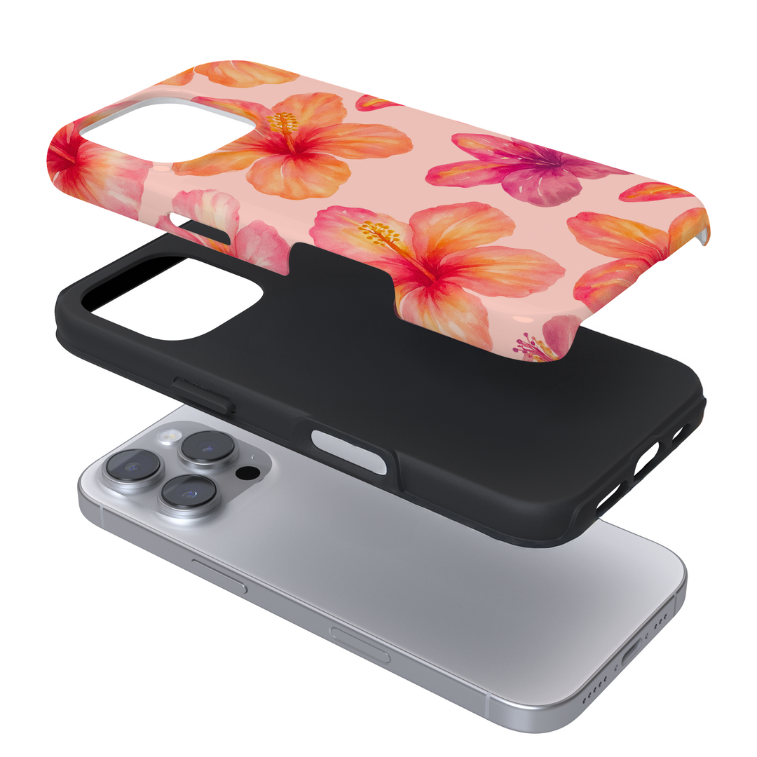 Expanded view of a pink phone case with a hibiscus pattern on a white background