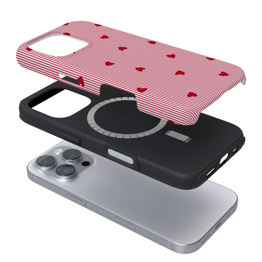 Expanded Magsafe phone case with a red striped pattern and hearts on a white background