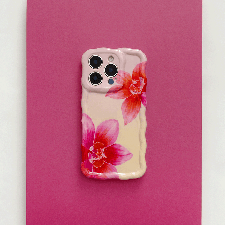 Pink and peach ombre Wavy Coconut Lane Phone Case with bright pink flower design.