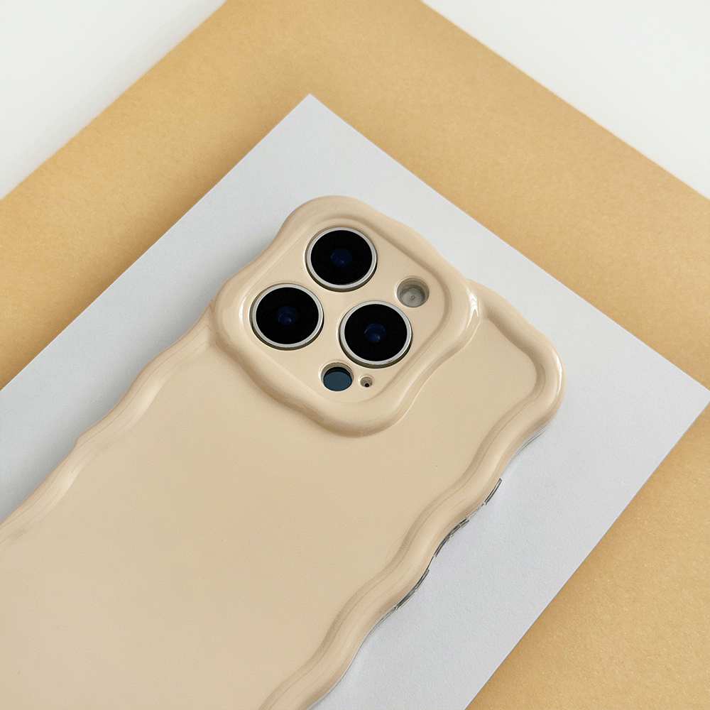 Plain yellow peach coloured Phone Case with wavy edge effect.