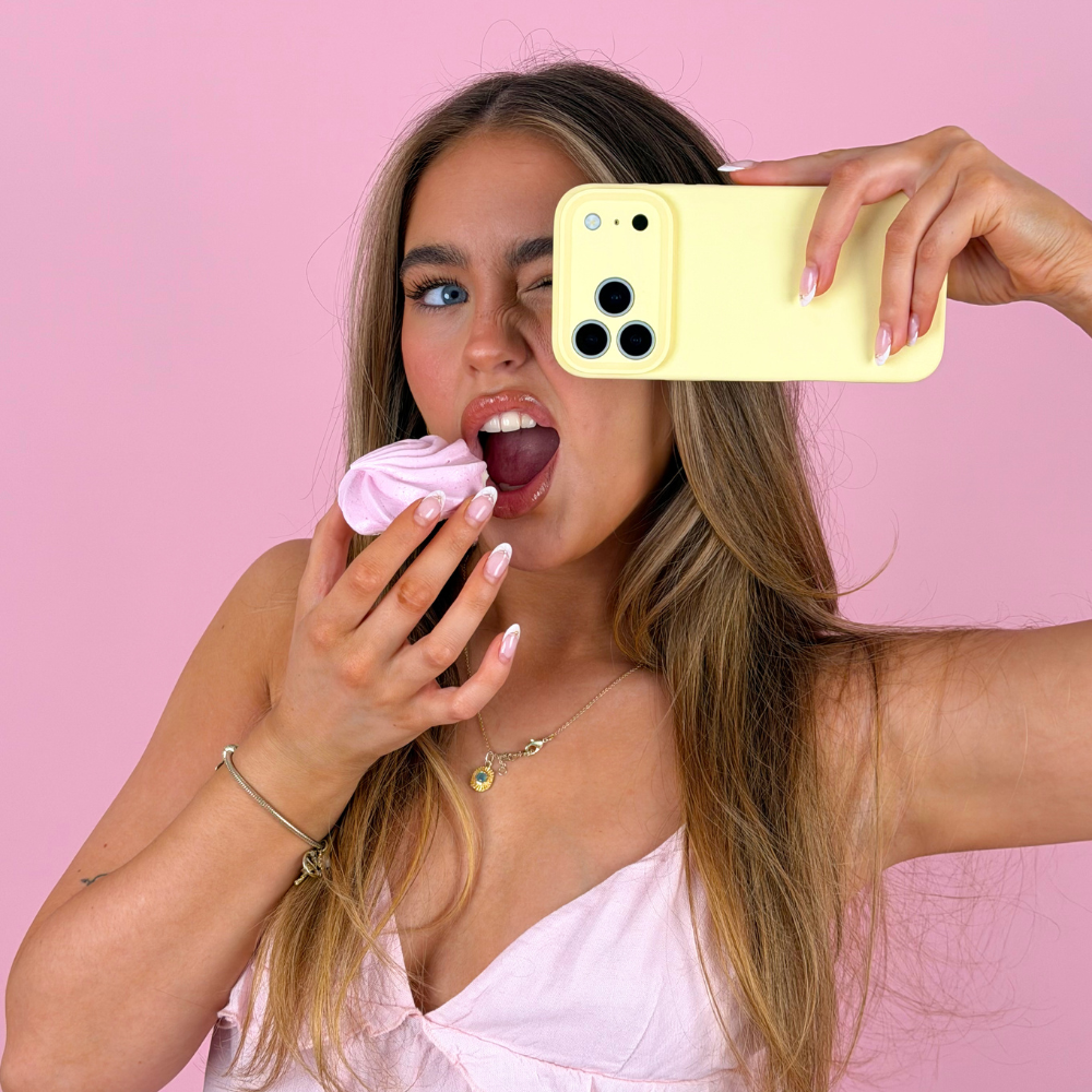Girl eating pink biscuit holding the butter soft butter yellow phone case