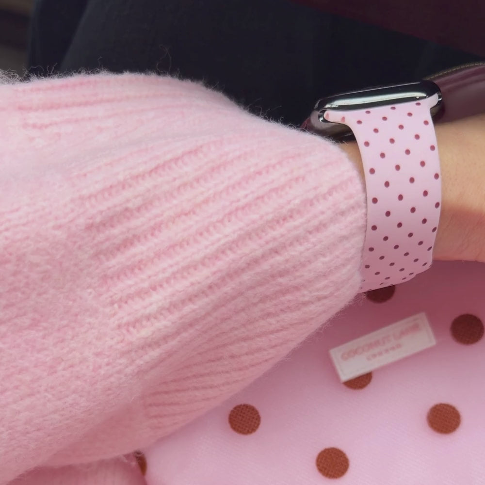 Dot Society Pink and brown Apple watch strap. Baby pink watch strap with dainty brown polka dot design.