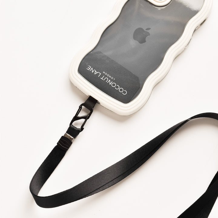A translucent and white phone case featuring a wavy border displays an Apple logo along with the words "COCONUT LANE" in white text. This Universal Phone Patch by Coconut Lane includes an attached black strap with a clip, perfect for securely carrying your phone. It is shown on a white surface.